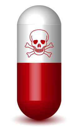 Illustration of a red and white capsule pill with a skull and crossbones symbol, sitting ominously atop a black box, indicating danger or poison.