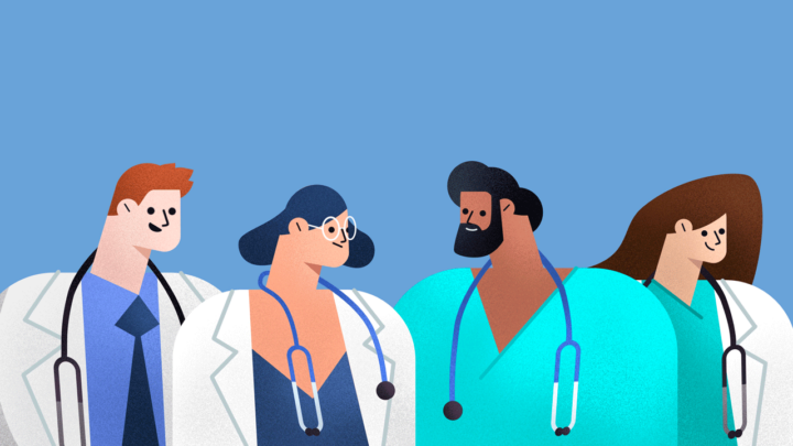 Four medical professionals with stethoscopes stand together against a blue background, wearing white coats and scrubs.